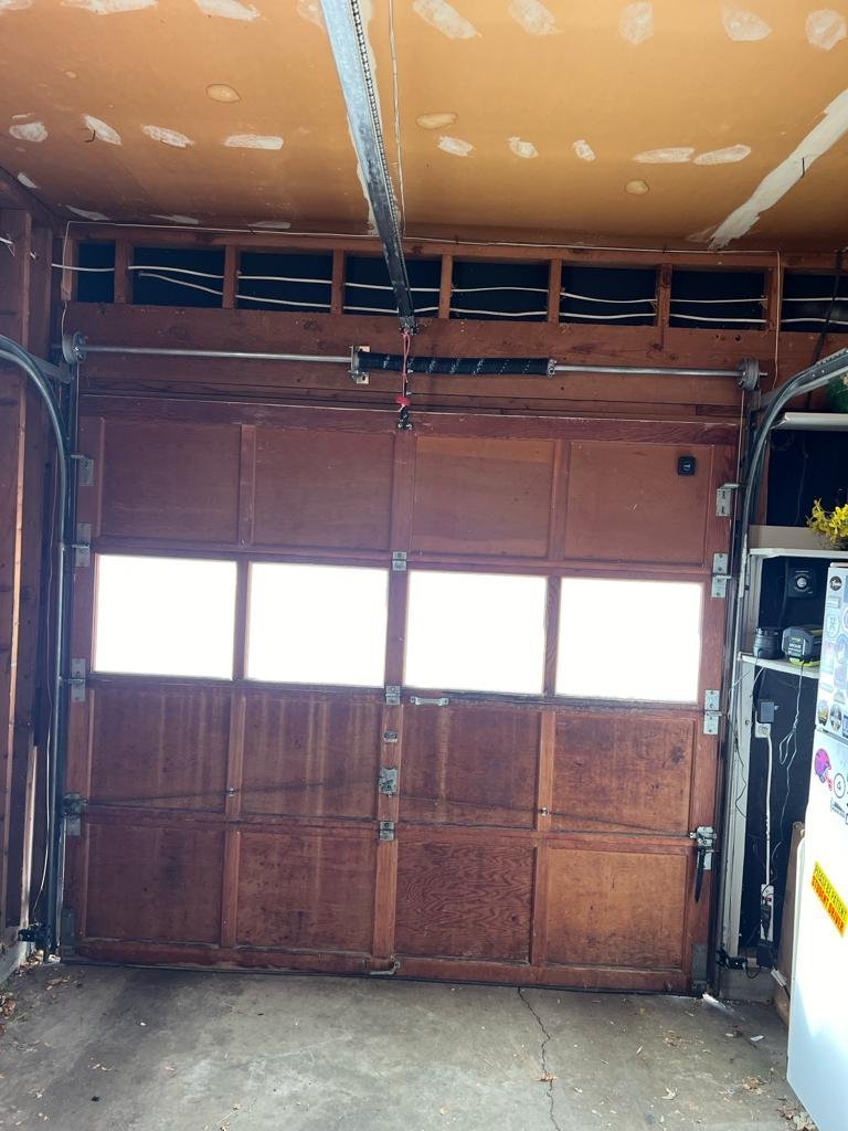 Residential garage door components evaluated for a repair