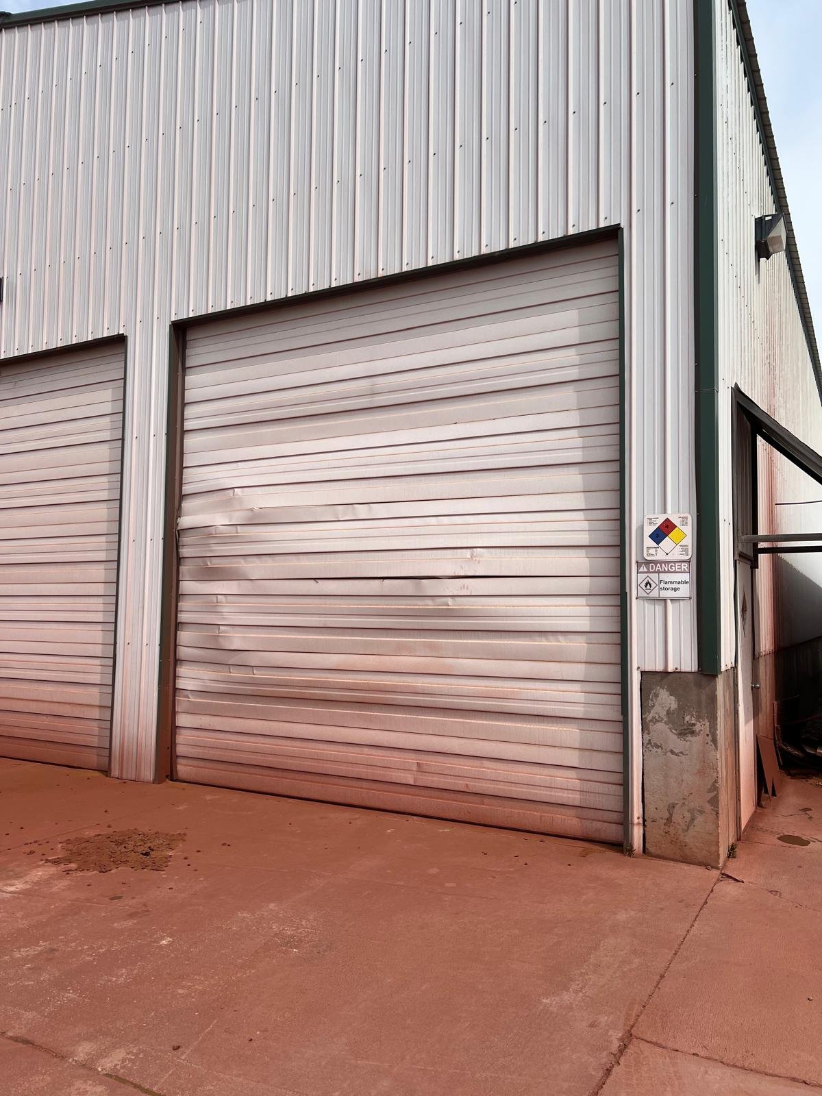 Residential garage door prepared for seasonal maintenance